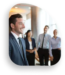 Business Man smiling standing with co-workers