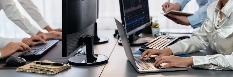 Young Business man smiling working behind desk